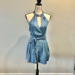 Denim romper with gold chain neckline